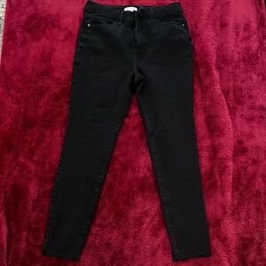 LC Lauren Conrad Black Skinny Stretch Jeans with slightly frayed hem.